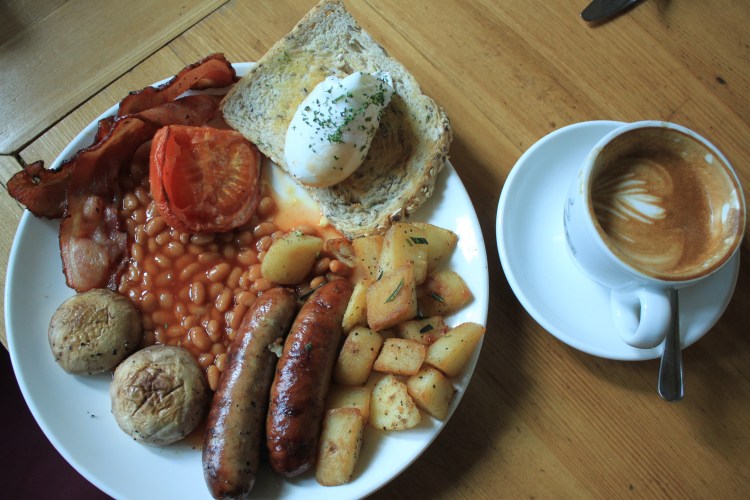 The famously fattening full English Breakfast at Vineyard Cafe, with a Rickshaw Roasters flat white