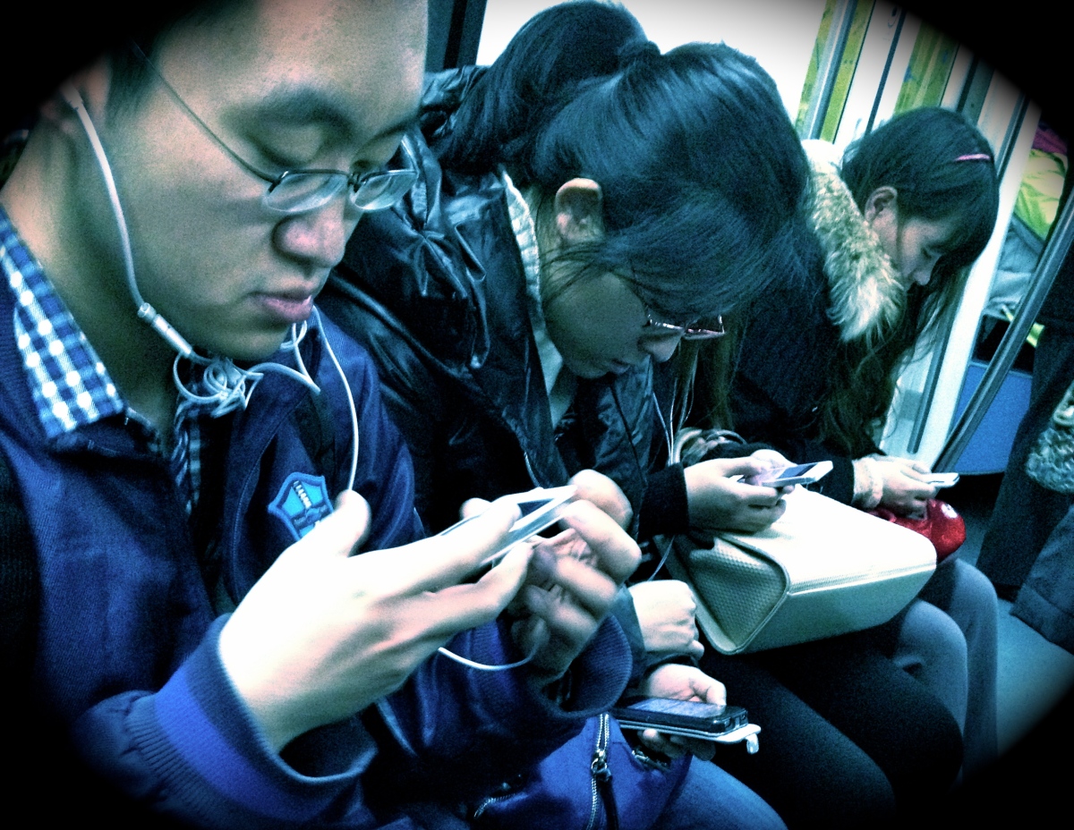 Passengers on the Beijing Metro, 2013.