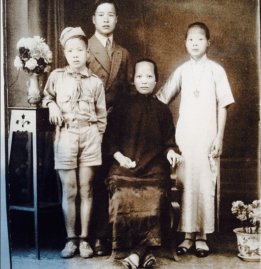 My dad's dad in uniform on the left. My great great grandmother in the centre. Date unknown. Image from my uncle.