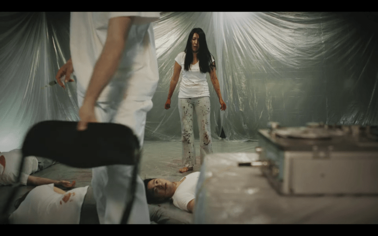 Screen shot from the short film M is for Musical Chairs. Not suitable for children.